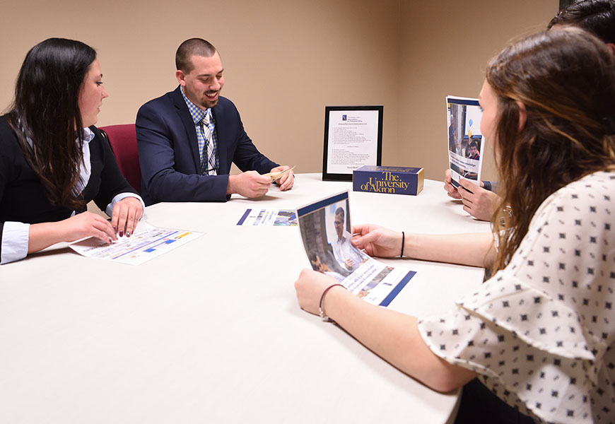 Students looking over a project